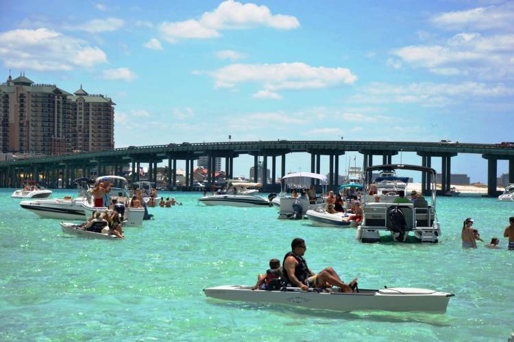 Crab Island Fun in the Sun Crab island in Destin Florida boating paddelboard pontoon rentals