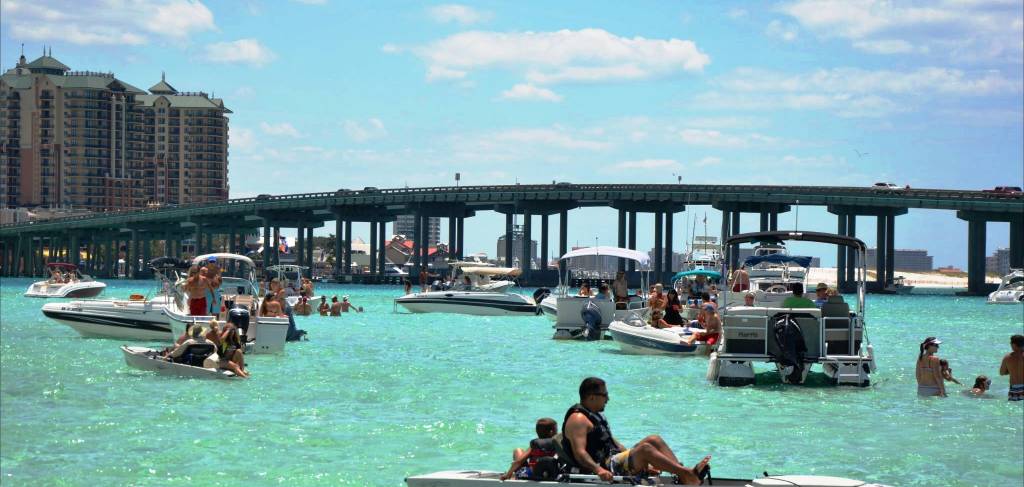 Crab Island Fun in the Sun Crab island in Destin Florida boating paddelboard pontoon rentals